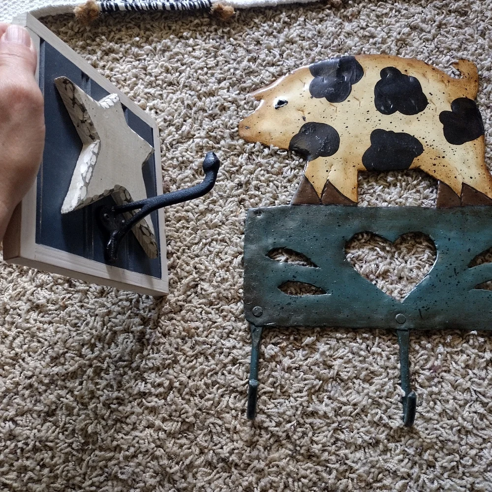 3 /$25 Two decorative wall coat hangers